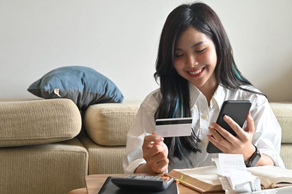 Filipino woman budgeting at home — Budgeting Tips Philippines